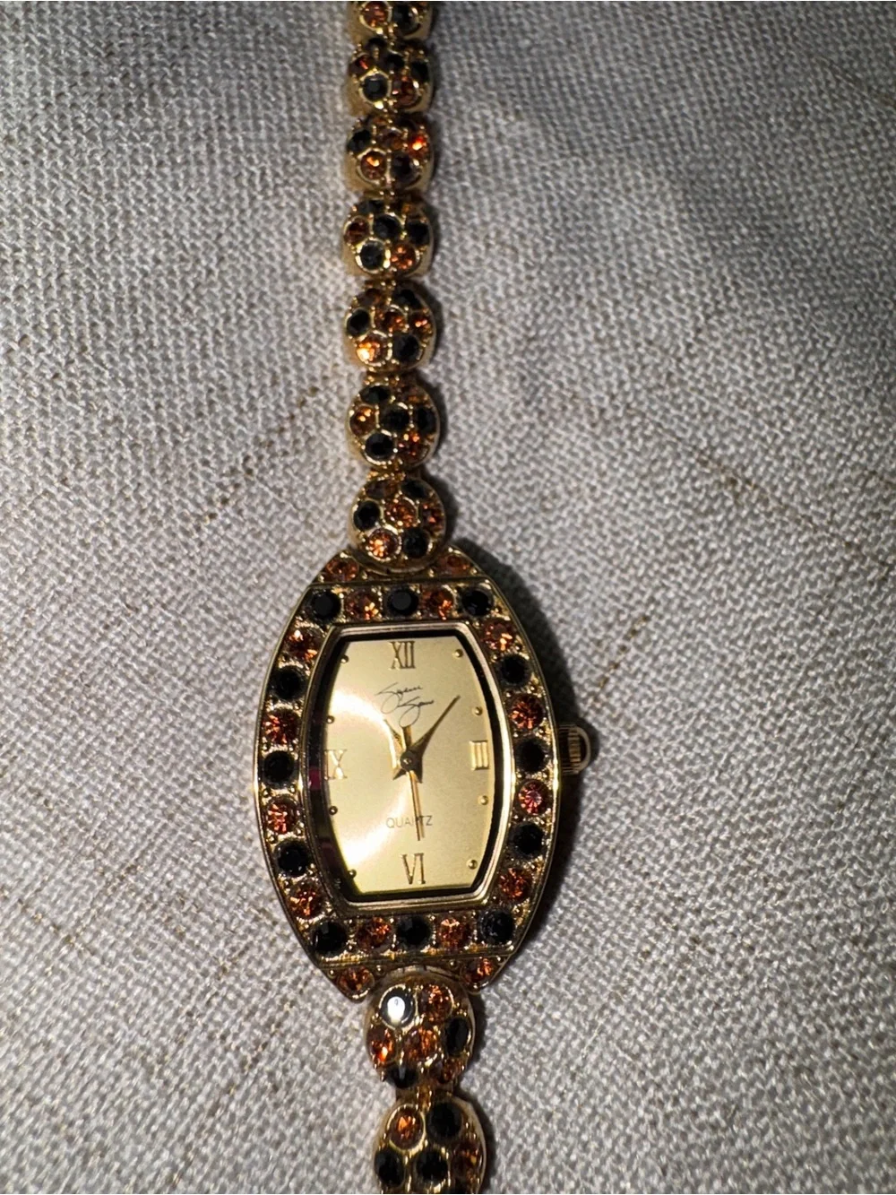 Gold-Tone Garnet Accent Womens Bracelet Watch